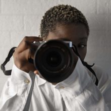 front-view-woman-working-as-photographer